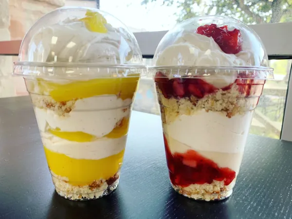 Fruit and yogurt parfaits in cups